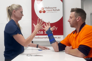 Melbourne Hand Rehab client with a hand and wrist splint