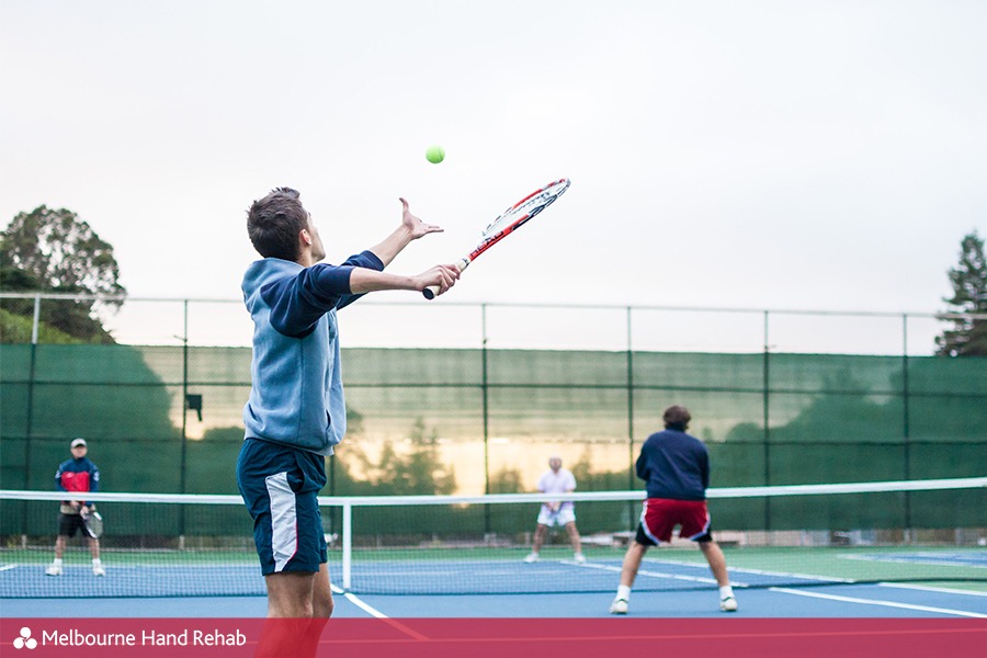 Group of men playing tennis