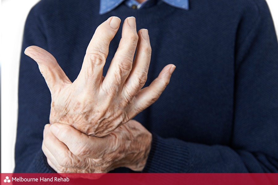 Older man with hand and wrist pain