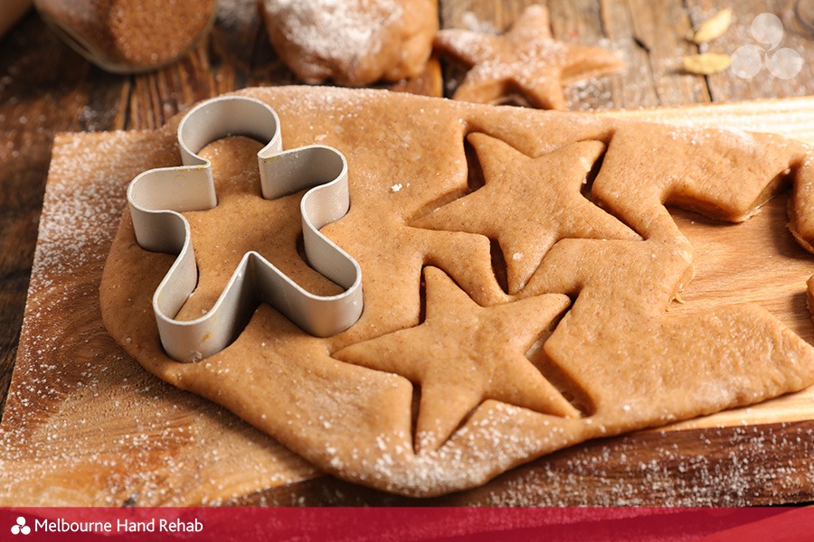 gingerbread dough and cookie cutters. Handy tricks & tools for Xmas baking if you have arthritis.