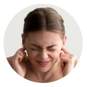 Woman with fingers in her ears to block out noise