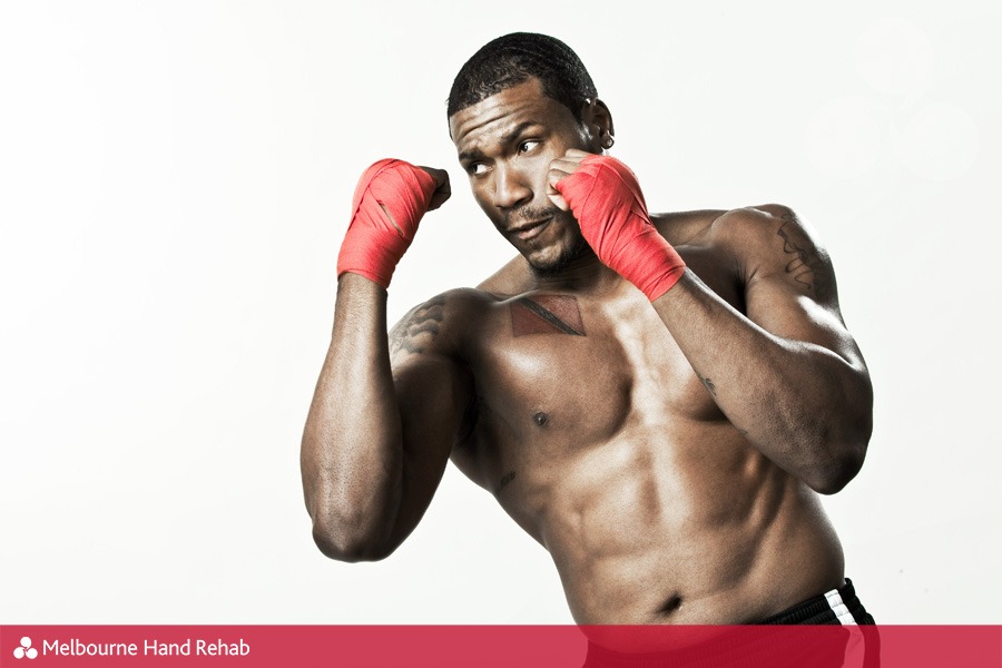 Young african american man in boxing stance.