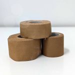 Rigid sports tape. Tough and durable - suitable for large joints and vigorous sports. Can cause irritation for sensitive skin